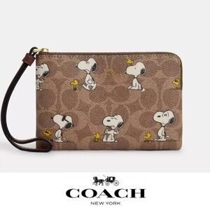 Coach Tan Snoopy Wristlet